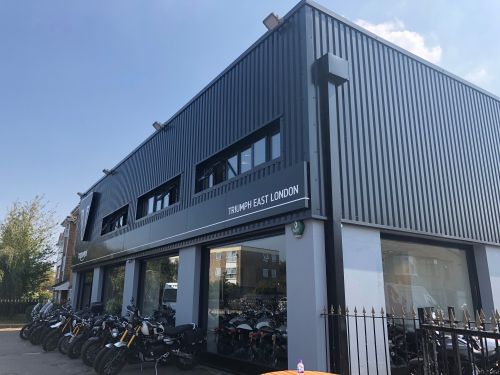 Click Here To Enlarge This Photo Of REFURBISHMENT Overclad existing Masonry Walls with 0.7mm Thick Pre Coated Black Prisma, Ral 9005 Galvanised Steel Profile Vertical Cladding